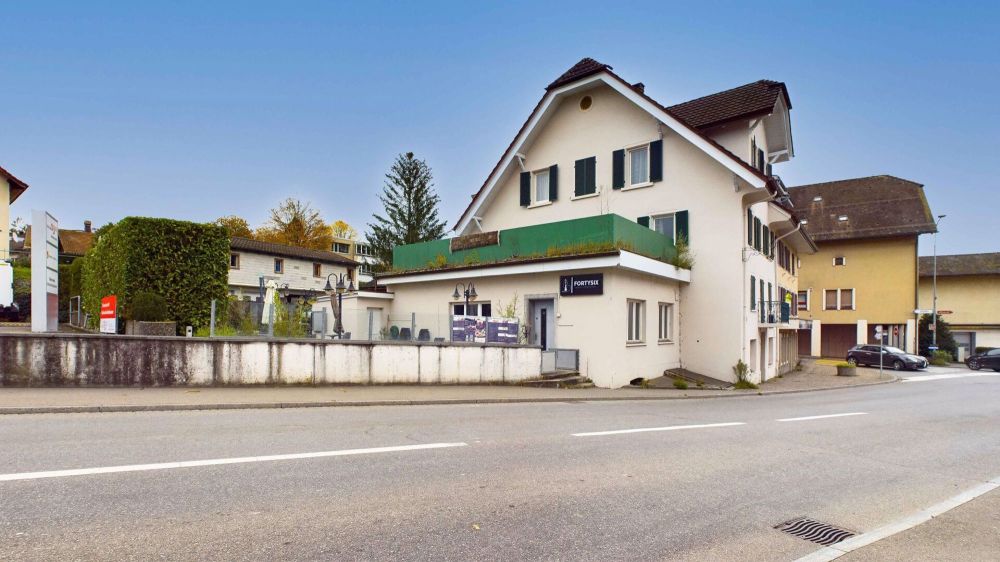 Vollvermietetes Mehrfamilienhaus mit Baulandreserve - Bild 1