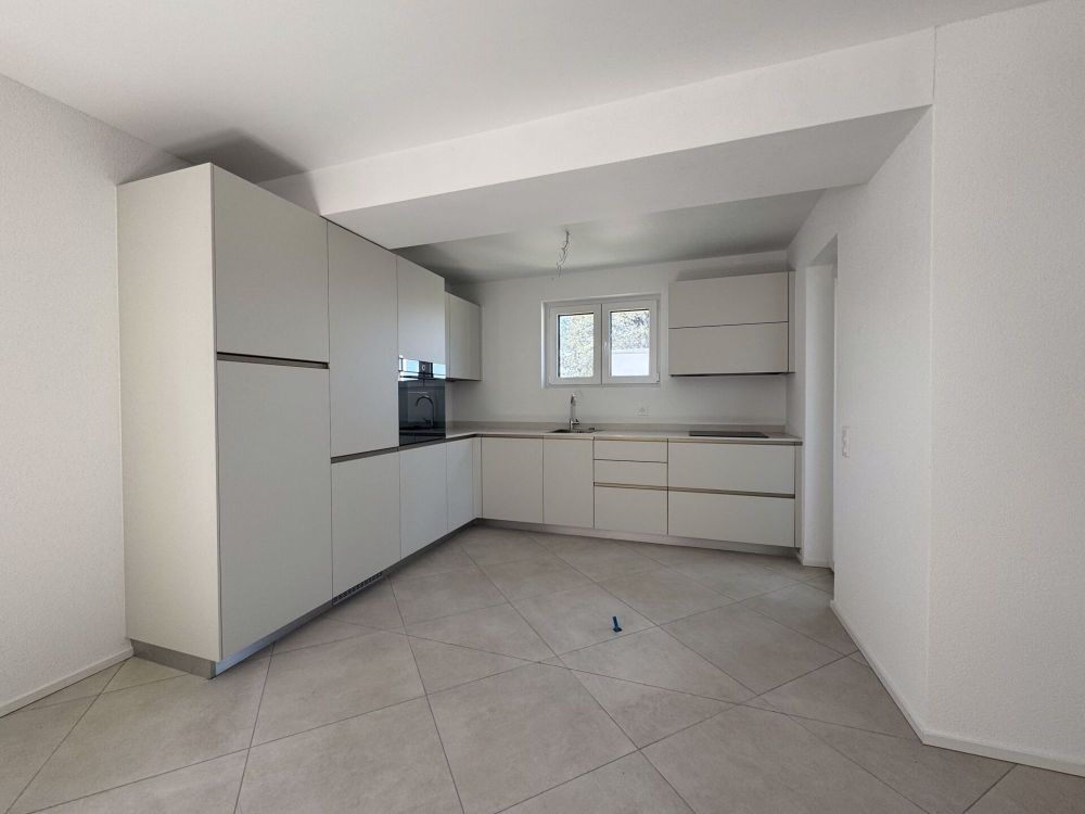 Neue und helle 5,5 Zimmer-Wohnung mit Garten - Bild 4