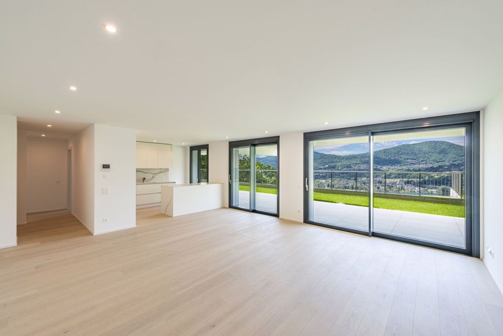Nuovo appartamento di 4,5 locali in zona prestigiosa con vista lago - Bild 2