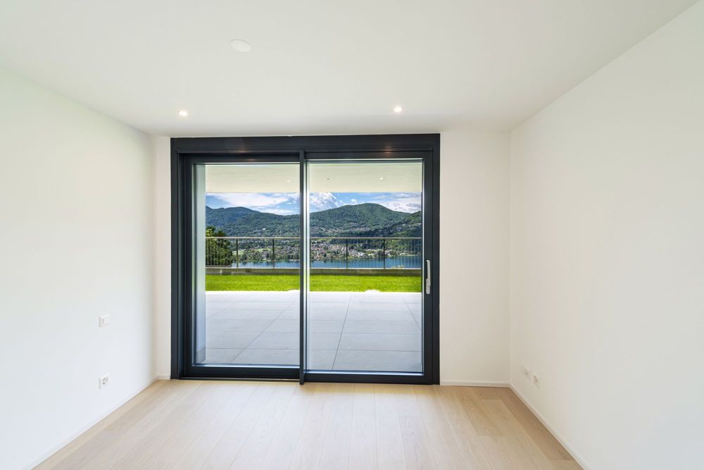 Nuovo appartamento di 4,5 locali in zona prestigiosa con vista lago - Bild 9