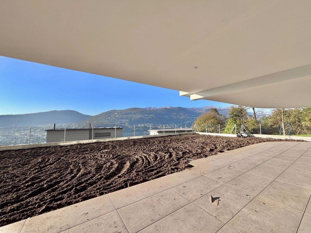 Luminoso appartamento con giardino e vista lago - Bild 2