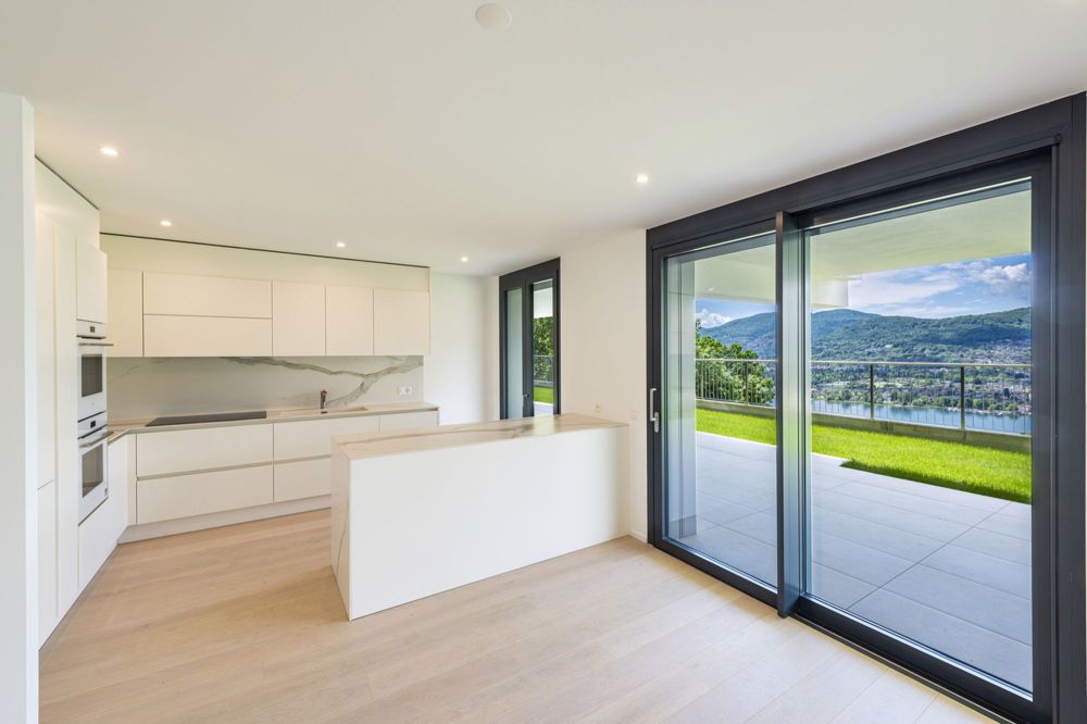 Nuovo appartamento di 4,5 locali in zona prestigiosa con vista lago - Bild 3