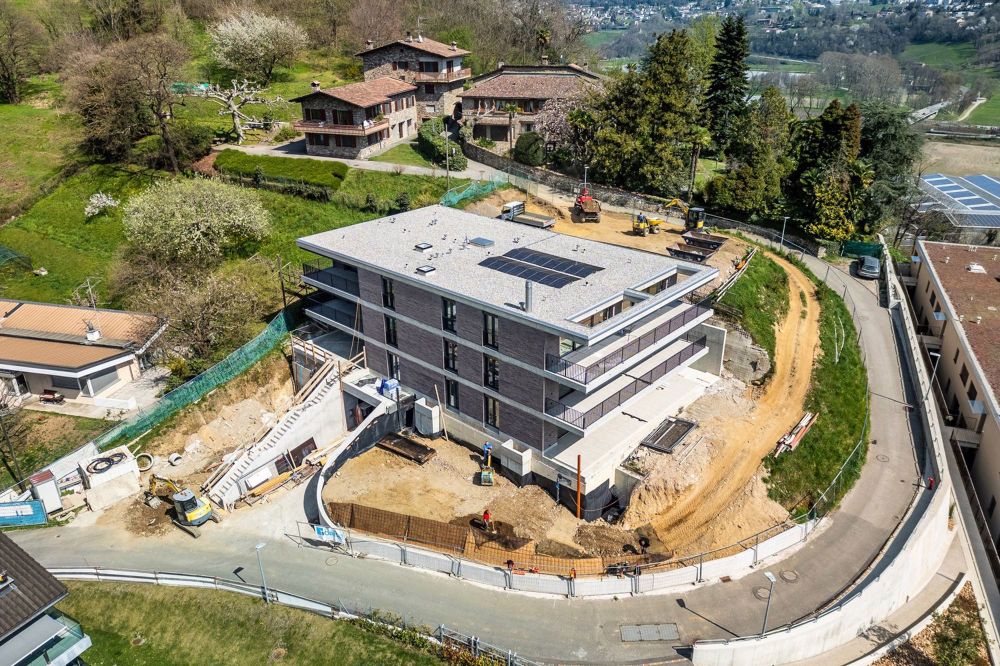 Nuovo appartamento 3.5 locali con doppia terrazza e vista sul verde - Bild 8