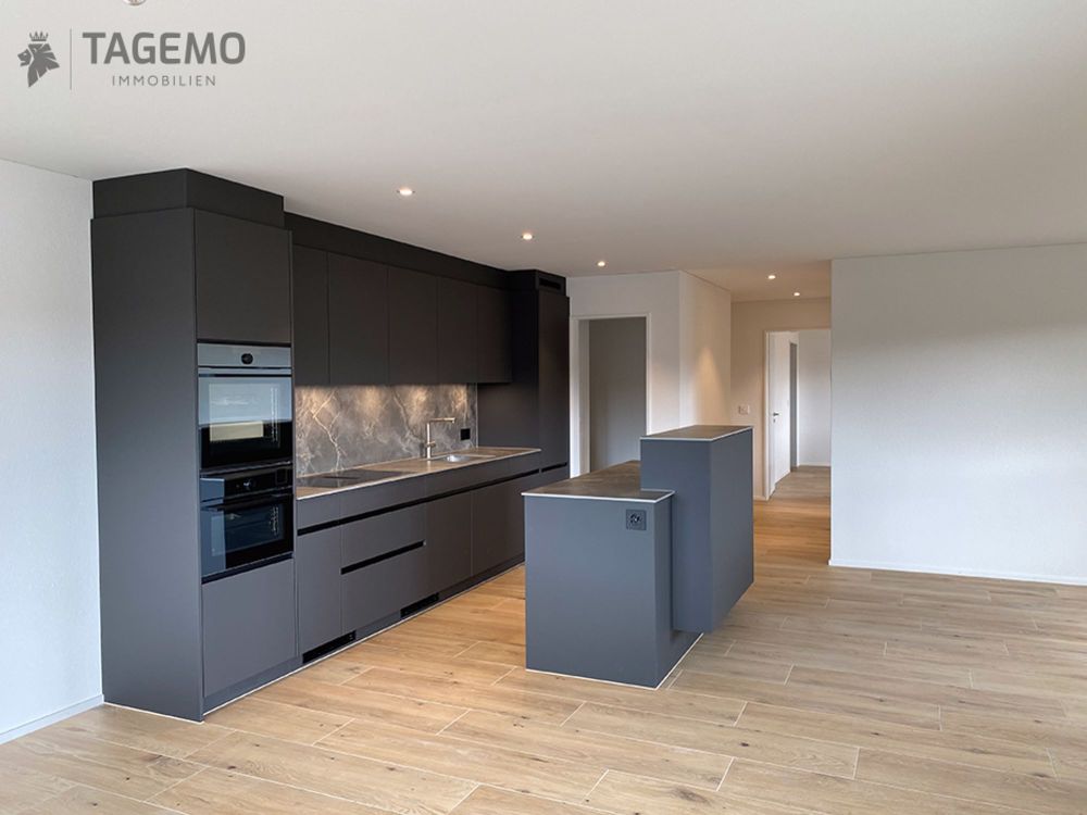 Wohnen mit Stil: helle 3½-Zi-Neubauwohnung mit Balkon & Lift in Glashütten - Bild 1