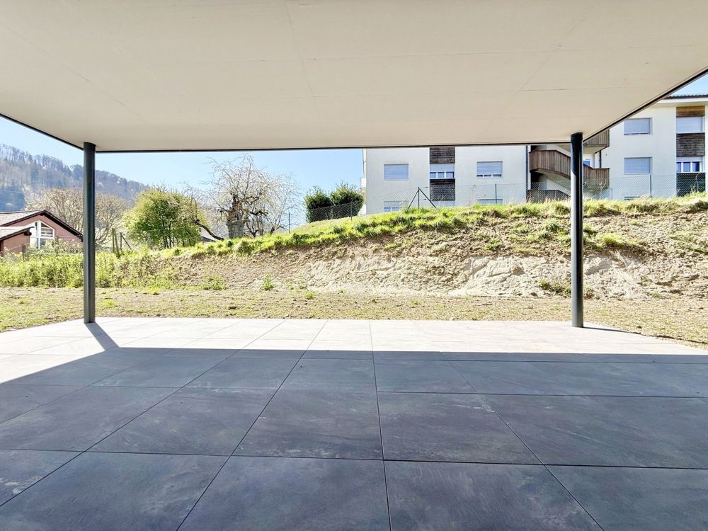 Superbe appartement neuf de 2.5 pièces avec terrasse et jardin privé - Terrasse / jardin