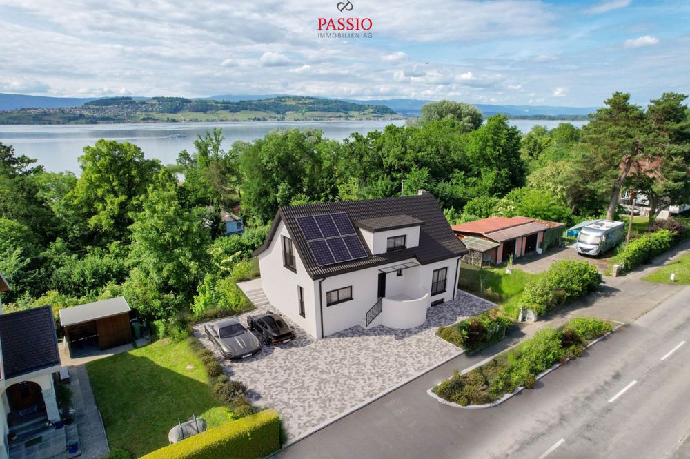 Maison individuelle neuve élégante de 5,5 pièces avec vue sur le lac - Bild 1