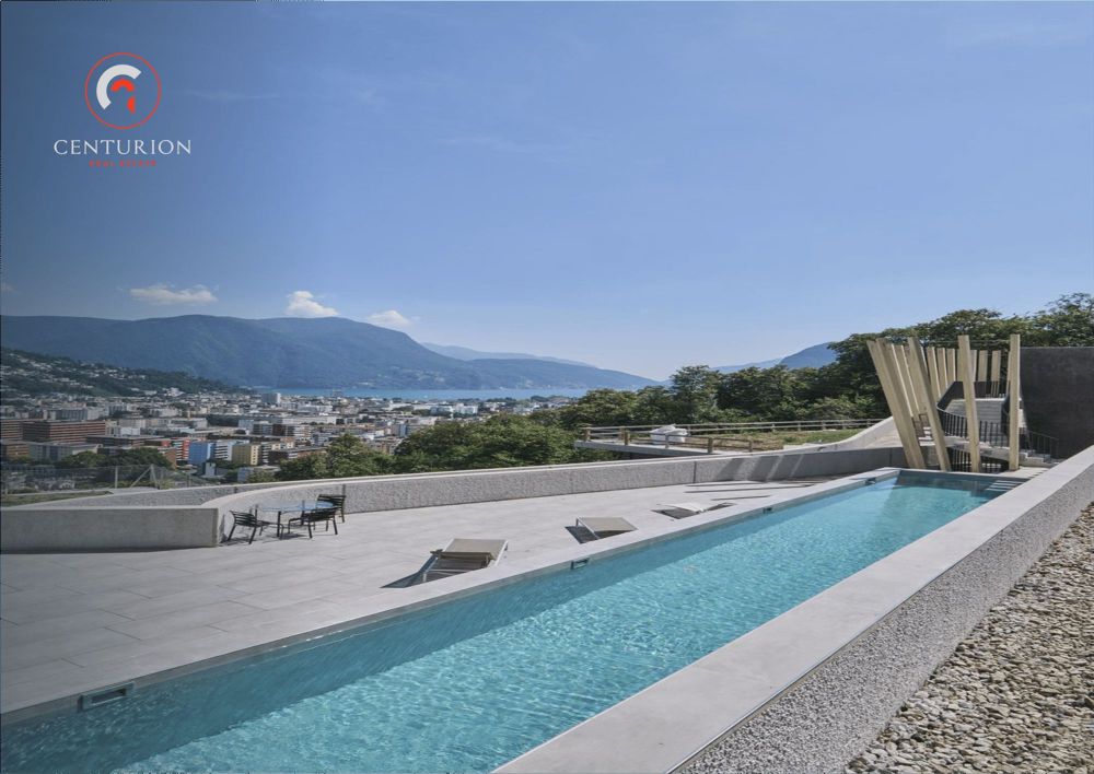 Elegante e moderno appartamento 2.5 con vista lago e giardino privato - Bild 1