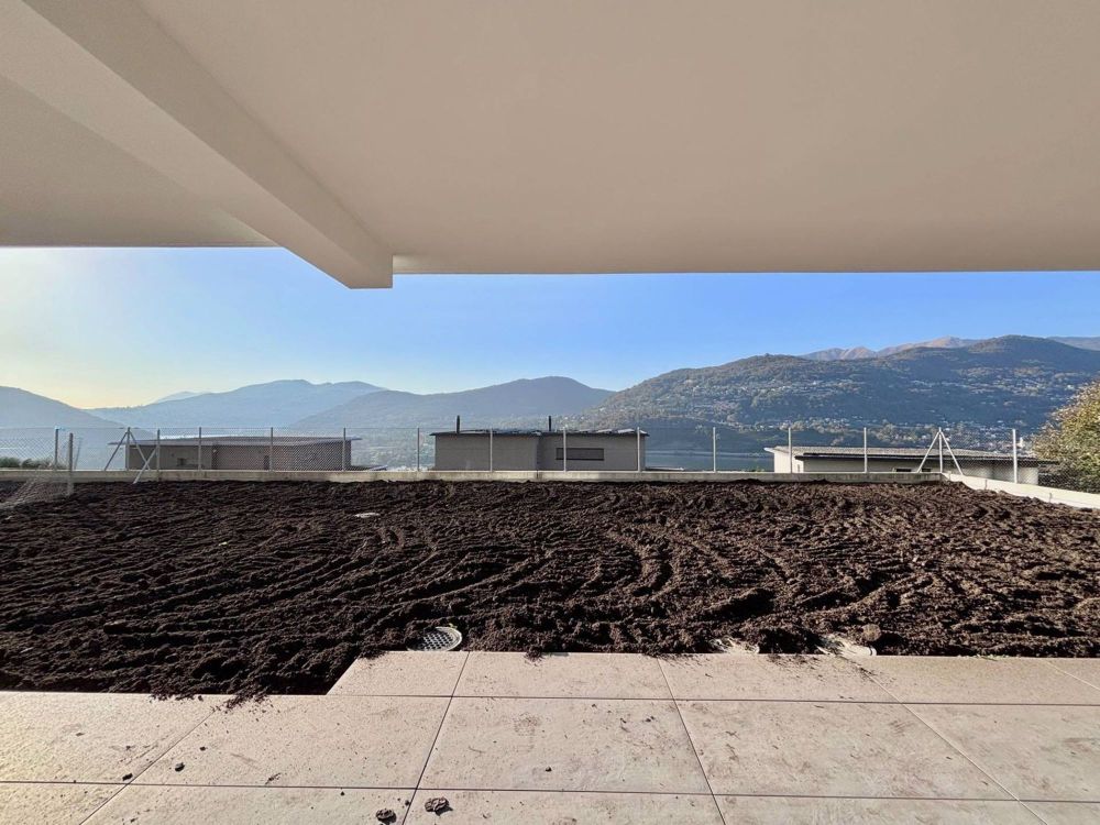 Luminoso appartamento con giardino e vista lago - Bild 3
