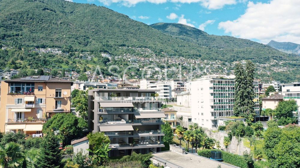 Residenza Cataleya Attico di prestigio di 5.5 locali con vista e posizione esclusiva | Residenza Cataleya Prestigeträchtige 5.5-Zimmer-Attikawohnung mit Aussicht und exklusiver Lage - Esterna 2 formato 16-9.jpg
