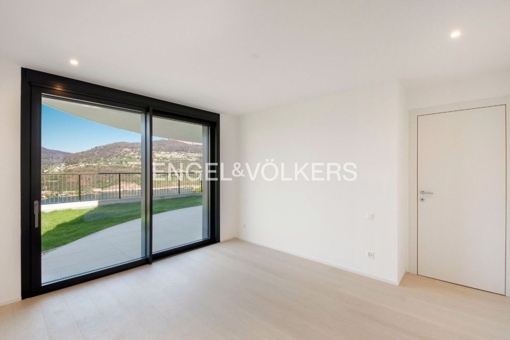 Appartamento di nuova costruzione con giardino e vista lago (73) - Bild 10