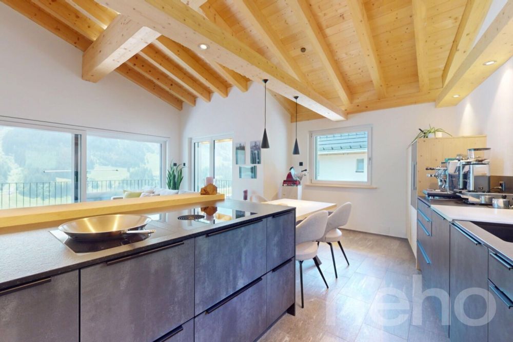 Moderne 4.5-Zimmer-Dachwohnung mit atemberaubender Aussicht in Rueras - Bild 9