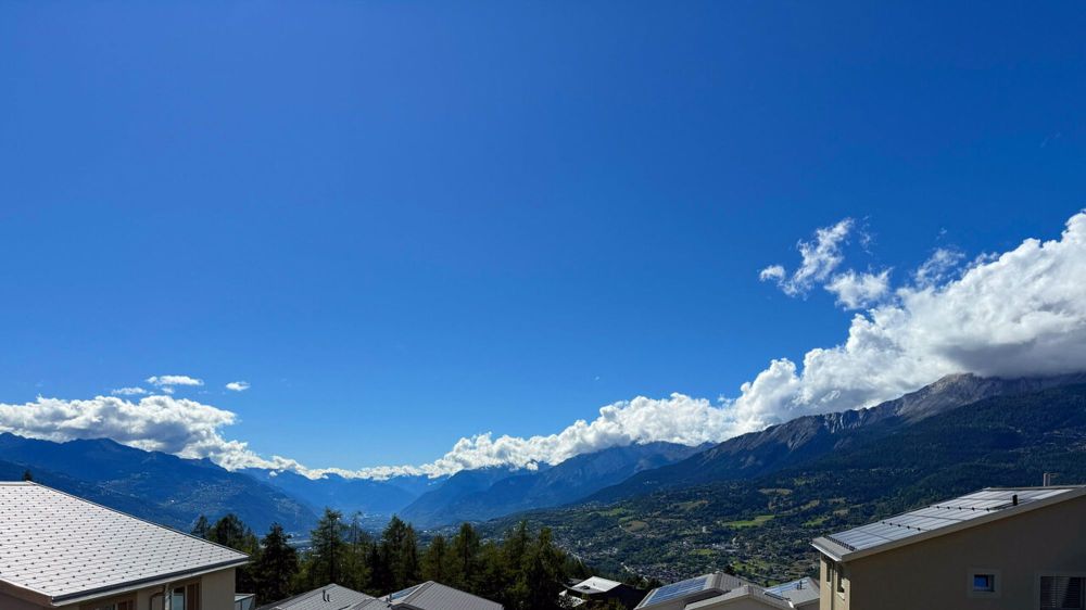 Großes Apartment 4.5 Zimmer neu (2. Etage - Attika) - Lens - Vue depuis le balcon - Appartement E21