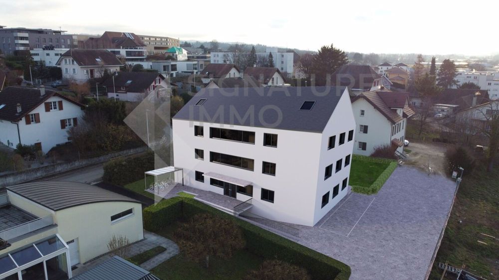 Prästig und hell - Attika 4.5 Zimmer mit Mezzanine - Immeuble