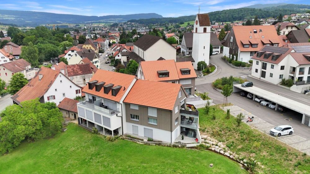 moderne 3.5-Zimmerwohnung mit eigenem Waschturm und Carport - Bild 13