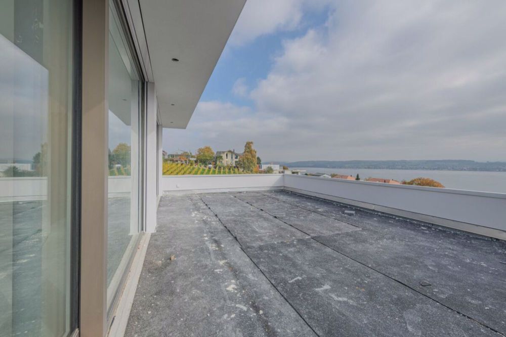 GROSSEN IMMOBILIEN - Exklusive 4.5-Zimmer-Maisonettewohnung mit Seesicht - Bild 4