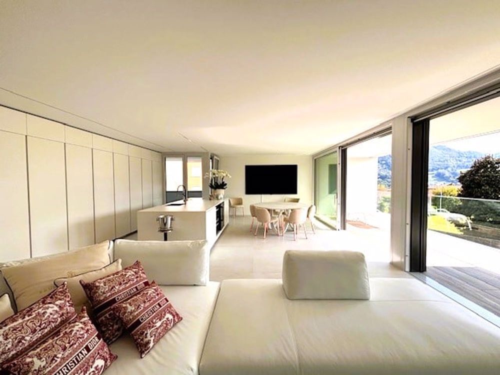 Raffiniertes 4.5-Zimmer-Apartment mit doppeltem Zugang in der Nähe von TASIS - Bild 1