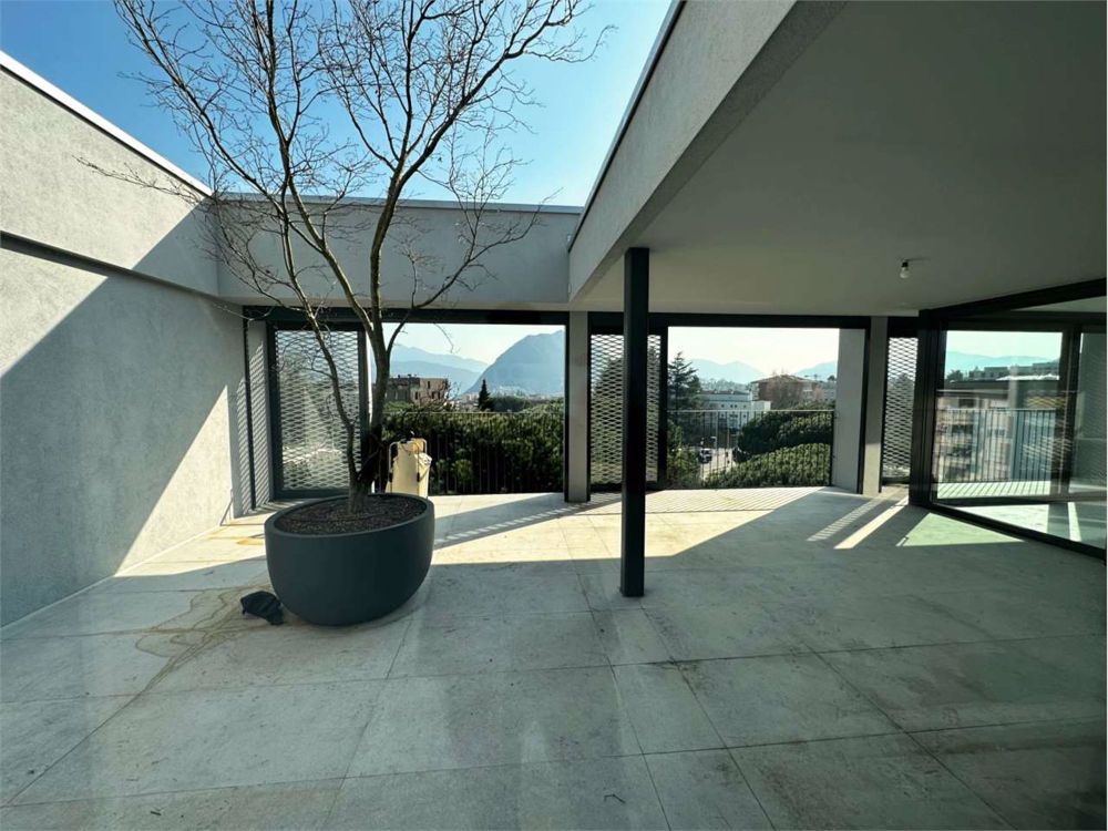 Splendido attico panoramico con ampio terrazzo - Bild 1