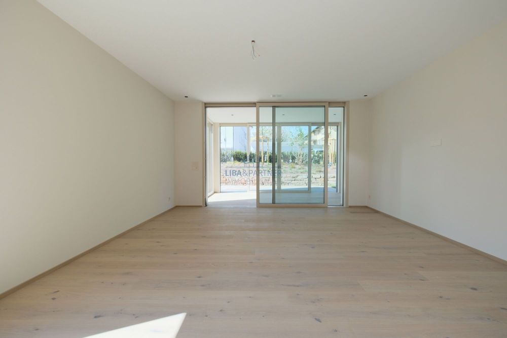 Exklusive Neubauwohnung - 170m² Garten und luxuriöses Wohnambiente - Wohnzimmer