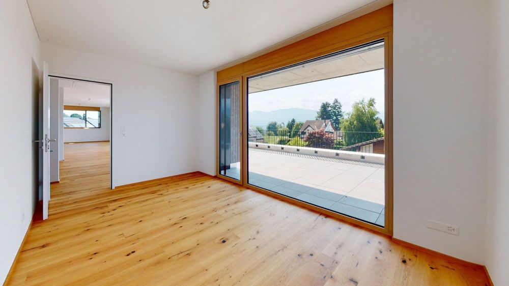 Traumhafte 4.5-Zimmer Attikawohnung mit stilvollem Design - Schlafzimmer 2 mit direktem Zugang zur Terrasse