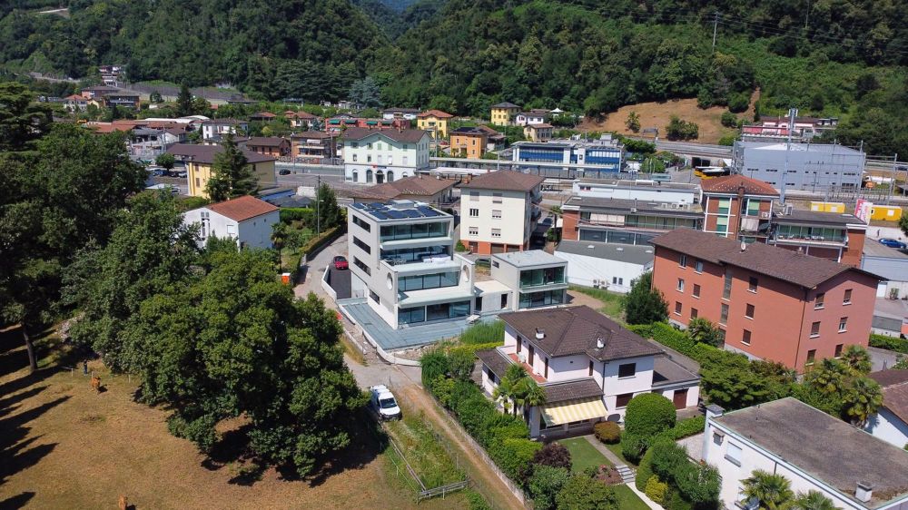 Elegante 4.5 locali al primo piano con terrazza e parziale vista lago - Bild 3