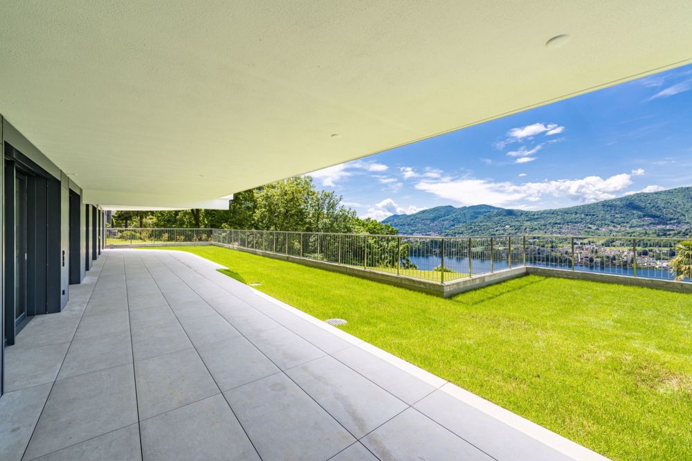 Nuovo appartamento di 4,5 locali in zona prestigiosa con vista lago - Bild 5