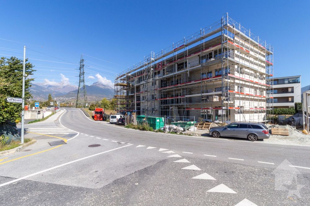 Dachgeschoss-Wohnung 4.5 Zimmer mit Westausrichtung und freier Sicht auf die Alpen - Bild 1