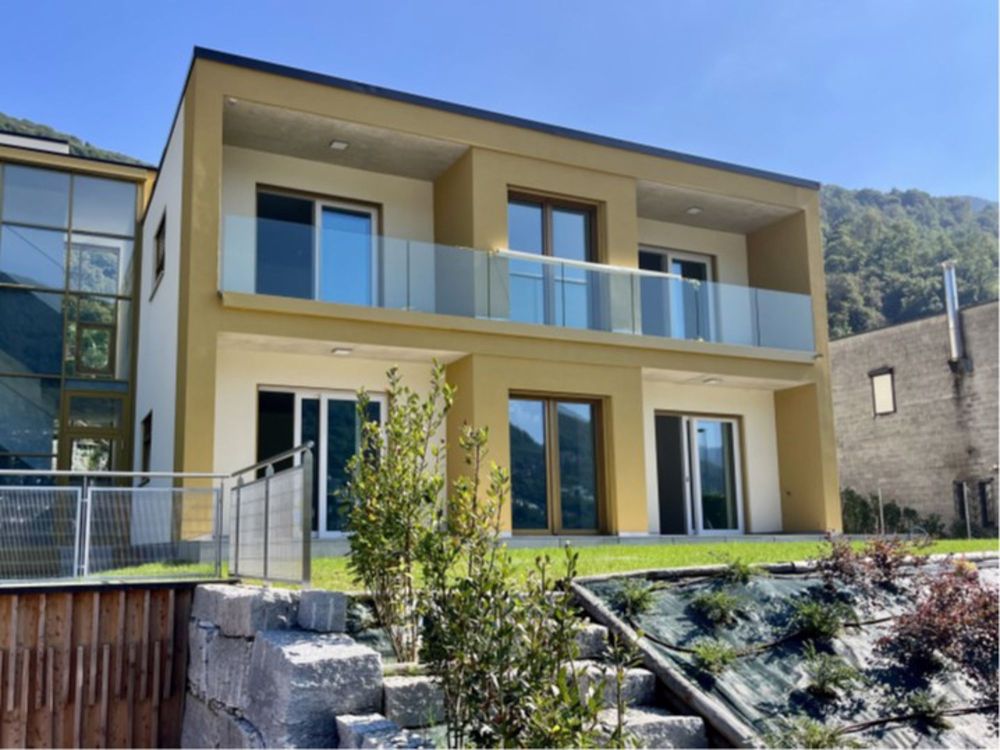 Geräumige 4.5-Zimmer-Wohnung mit Garten und Seeblick in Brusino Arsizio - Bild 1