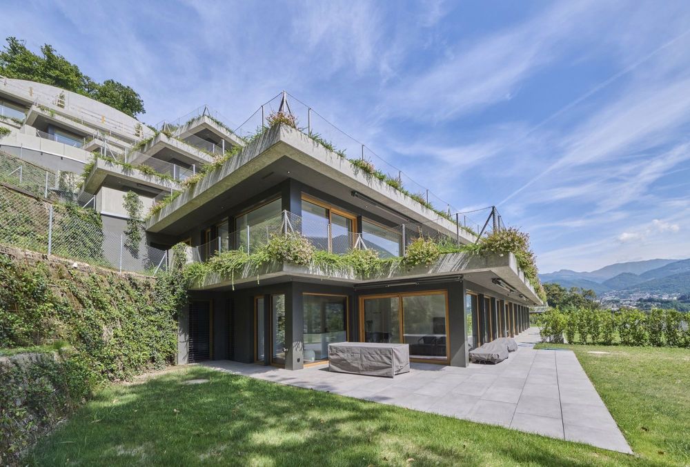 Nuovo 2,5 locali con giardino e vista aperta in residenza di pregio - Bild 4