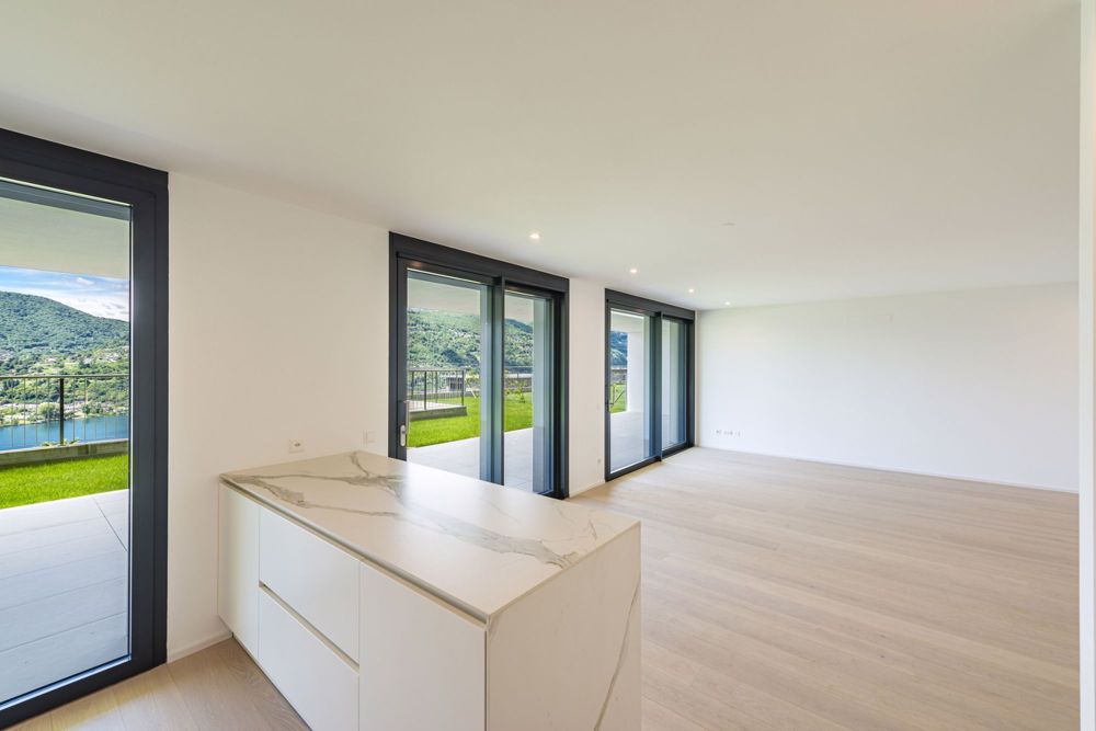 Nuovo appartamento di 4,5 locali in zona prestigiosa con vista lago - Bild 7