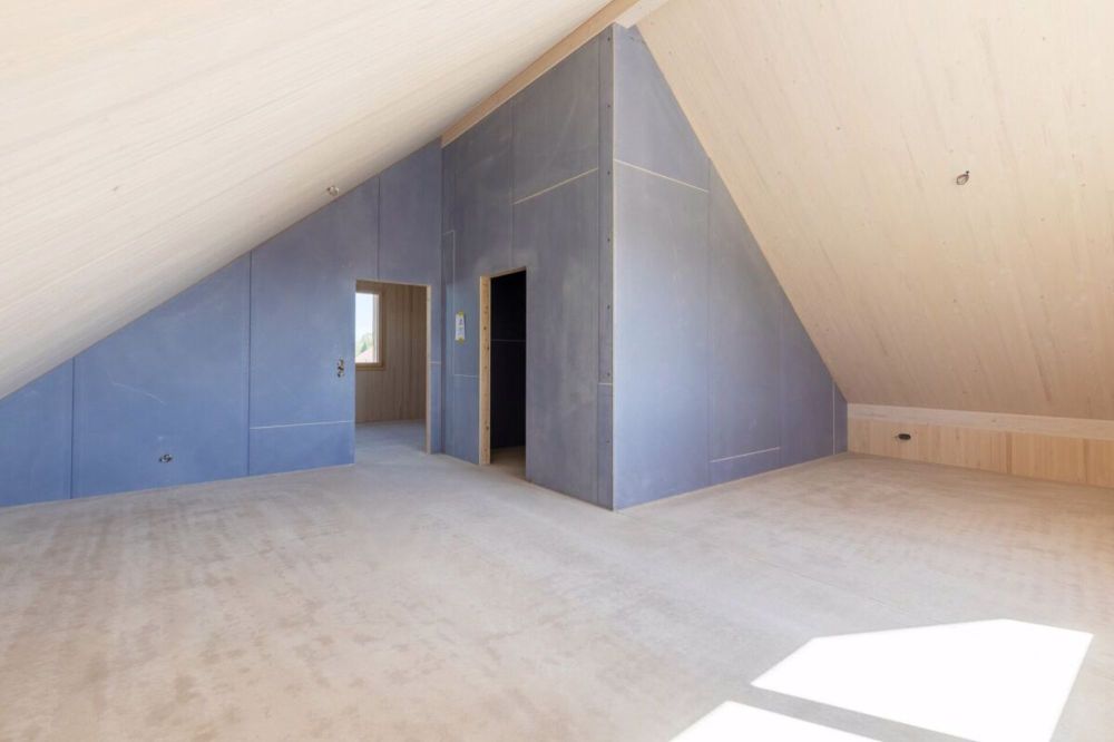 Einzigartige Holz-Einfamilienhäuser - Geräumiges Dachgeschoss