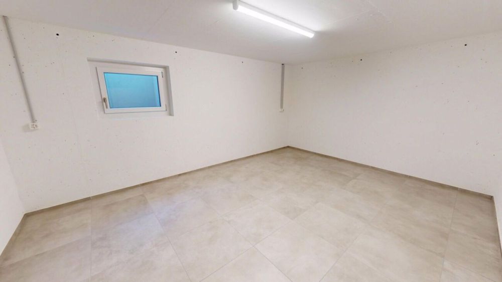 Neubau-Doppeleinfamilienhaus in Buchs SG - Stilvoll wohnen mit Nachhaltigkeit und Komfort - Keller 2