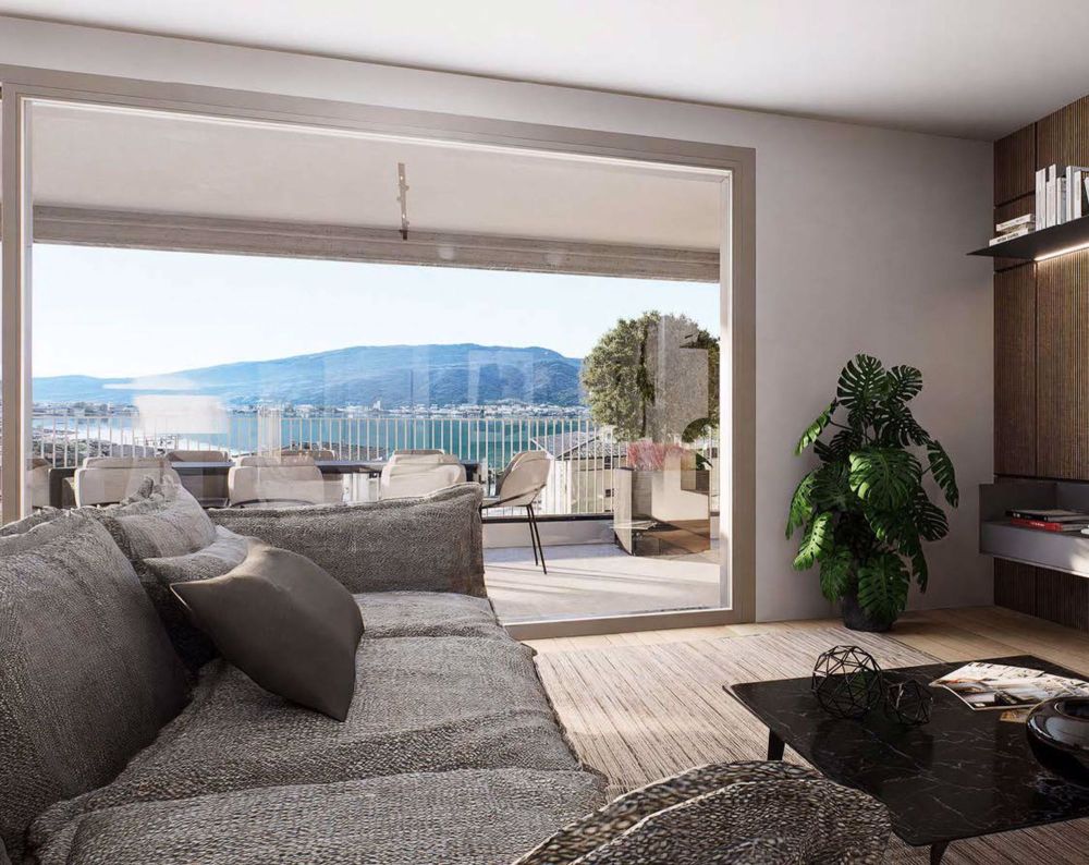 Neue Wohnung mit Seeblick und Garten in Capolago - Bild 1