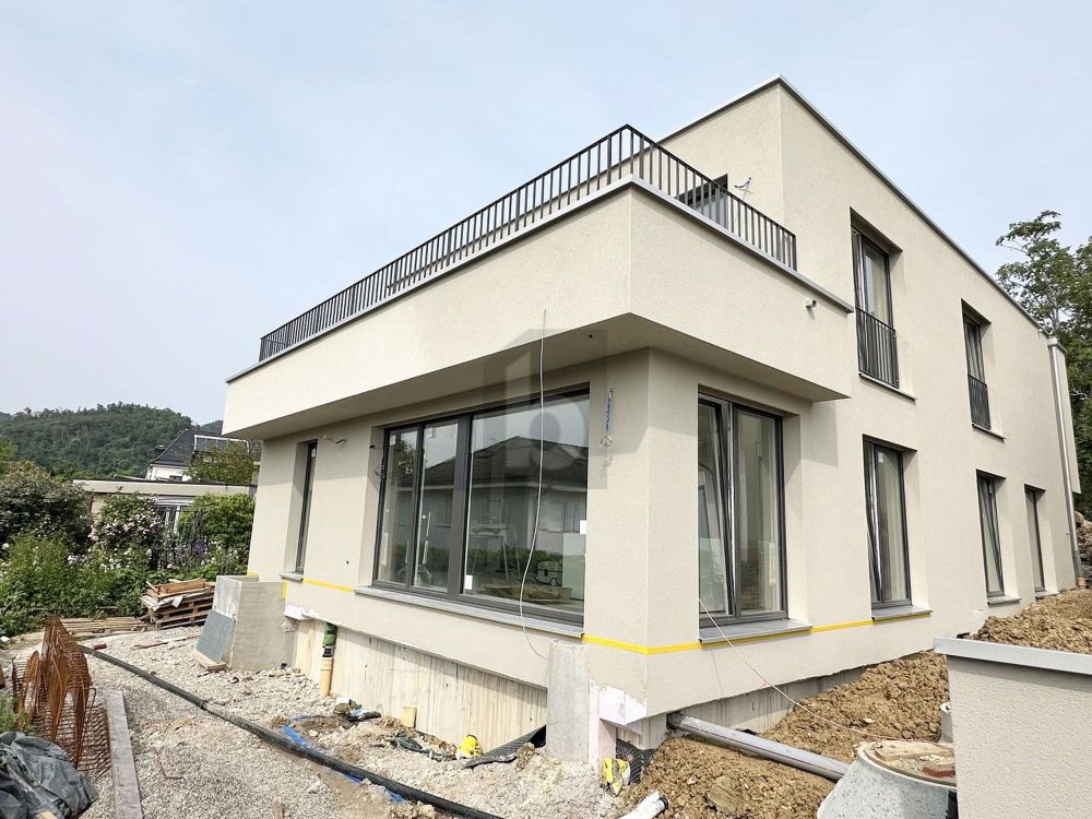 NEUBAU MIT GROSSER TERRASSE AN TOP LAGE - Bild 1