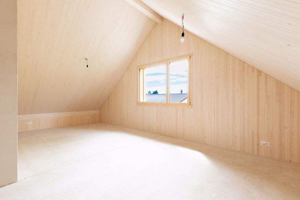 Natürlich Zuhause: Modernes Einfamilienhaus - Dachzimmer mit Aussicht