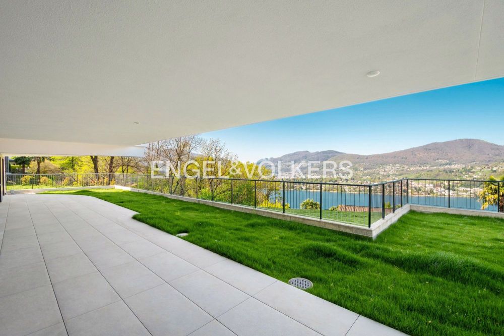 Appartamento di nuova costruzione con giardino e vista lago (73) - Bild 1