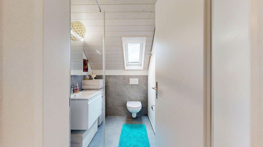 moderne 3.5-Zimmerwohnung mit eigenem Waschturm und Carport - Bild 6