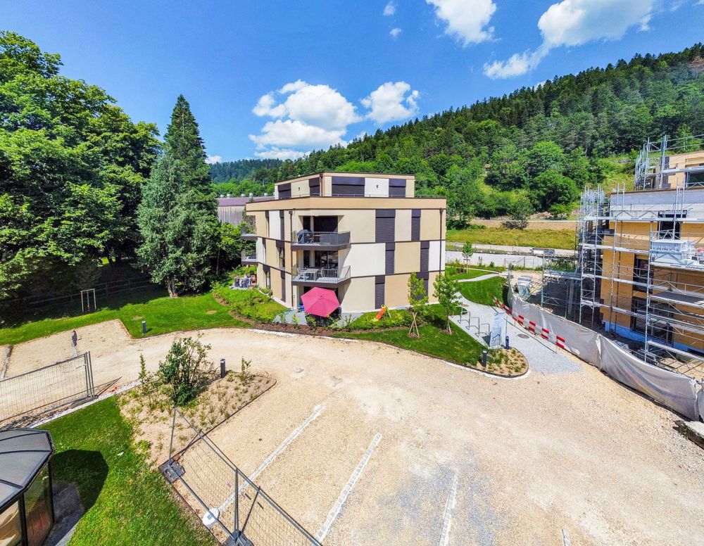 Neue 3.5-Zimmer-Wohnung, Terrasse und Garten in Campagne Pernod, Lot B3 - Vue sur le bâtiment A