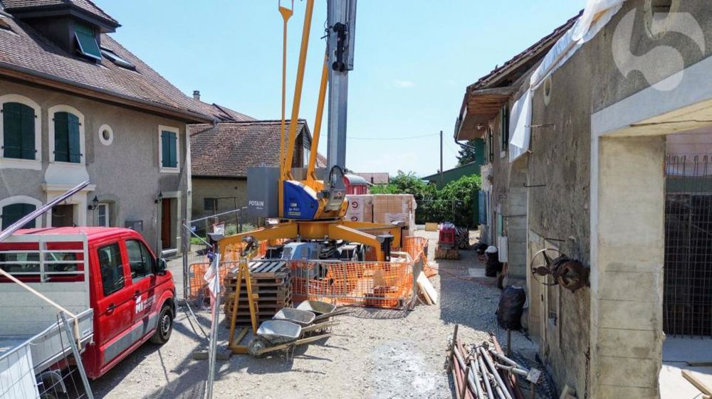 Villars-le-Terroir, chantier ouvert : Spacieux 3.5 pcs de 89 m2 avec balcon - Photo depuis le balcon en direction du Sud côté cour intérieure