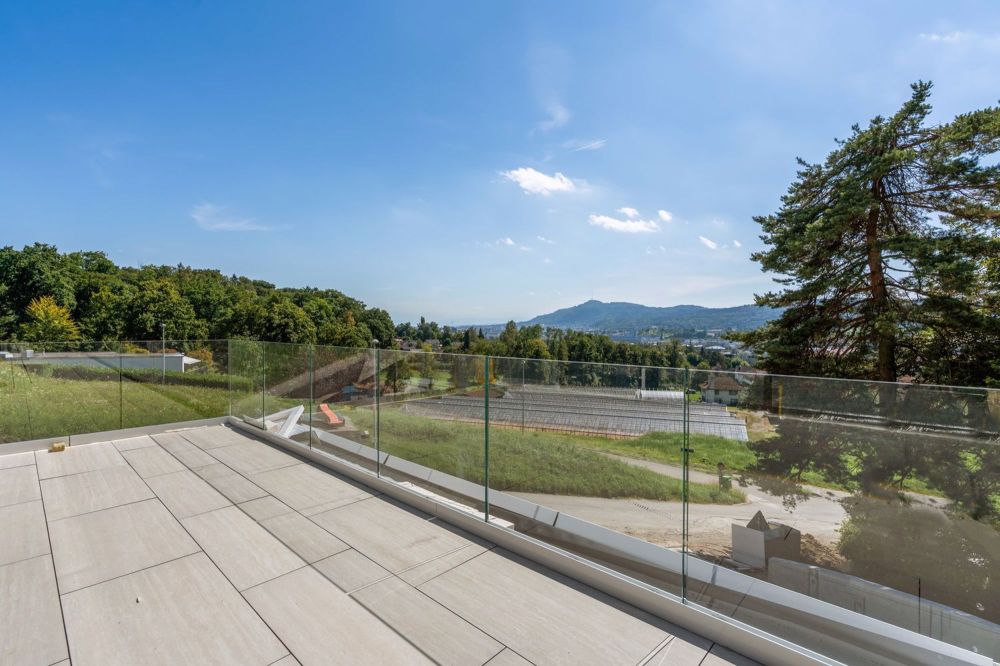 Exklusive 5.5-Zimmer-Neubau-Terrassenwohnung mit Weitblick - Bild 1