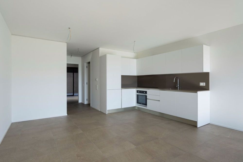 Appartamento in Vendita nella Residenza Querciabella a Bioggio con Vista Lago - Bild 4