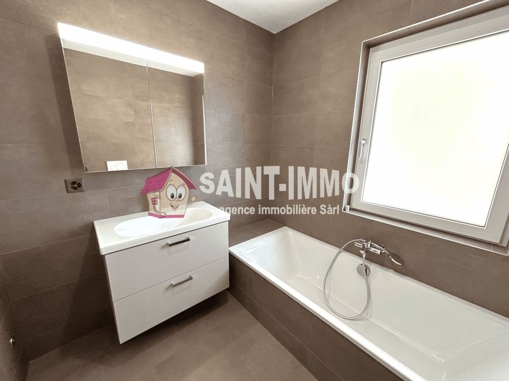 Appartement neuf de 4.5 pièces (104 m2) avec terrasse / jardin privatif et couvert pour voiture - Bild 6