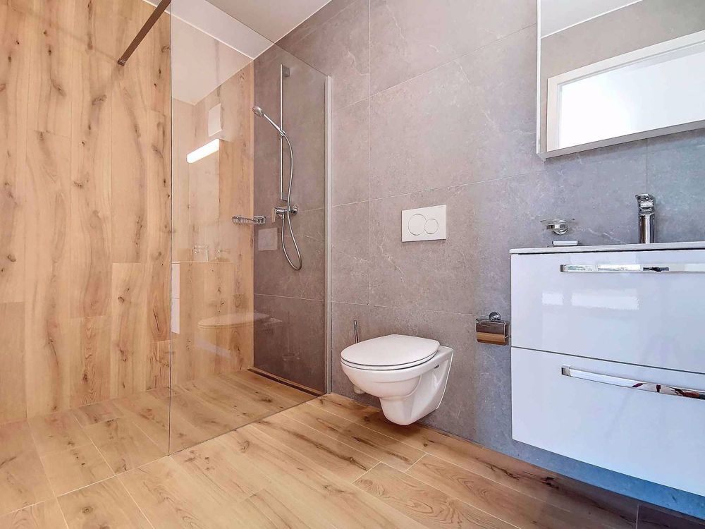 Neuf ! Appartement de 4.5 pièces avec jardin & vue lac - Bild 8