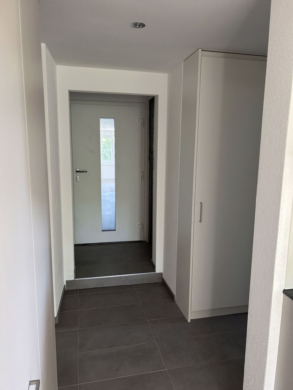 Erstvermietung: Hochwertig sanierte 3-Zimmer-Wohnung mit Garten, Sitzplätzen & Carport in Rüttenen (SO) - Eingang_1