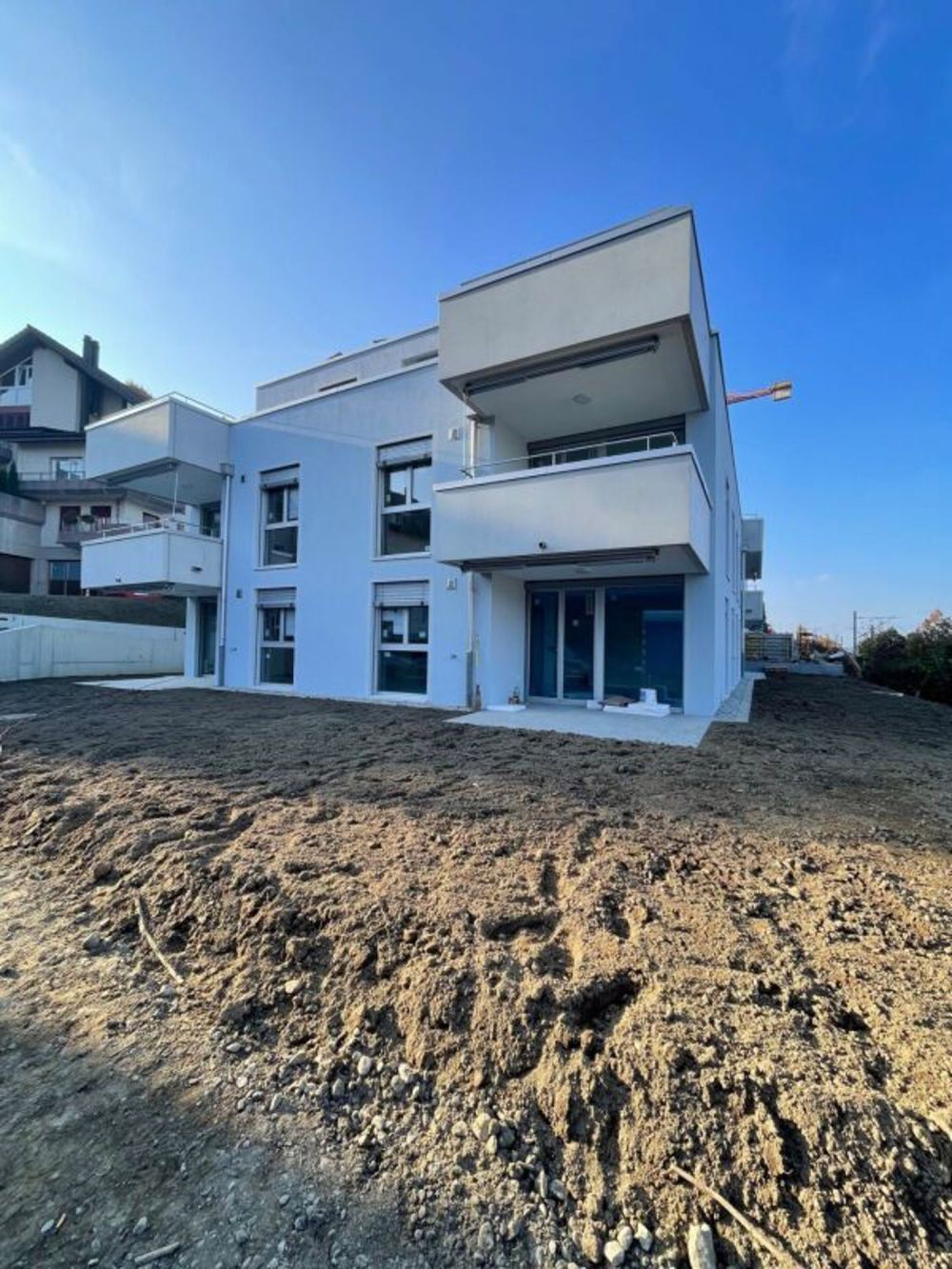 Steinbach Belp - 4,5 Zi. Gartenwohnung - Gedeckte Terrasse mit viel Grünfläche