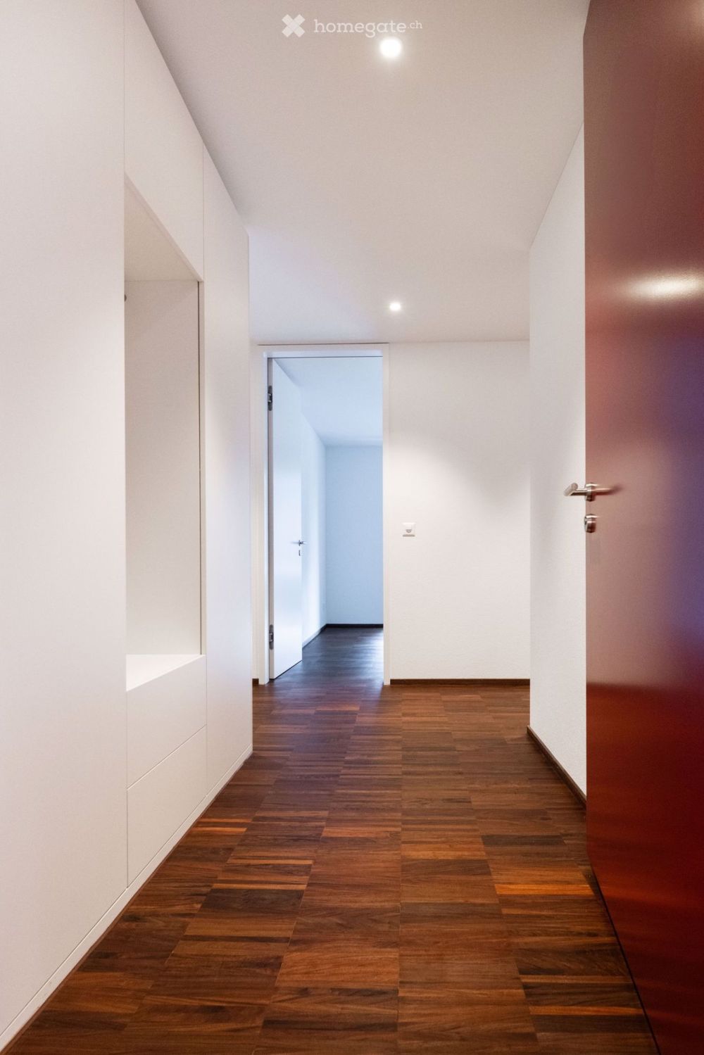 Moderne 4.5-Zimmer-Wohnung in Neubau mit Balkon und Aufzug - Bild 1