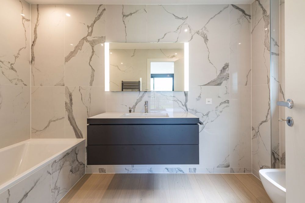 Nuovo appartamento di 4,5 locali in zona prestigiosa con vista lago - Bild 11