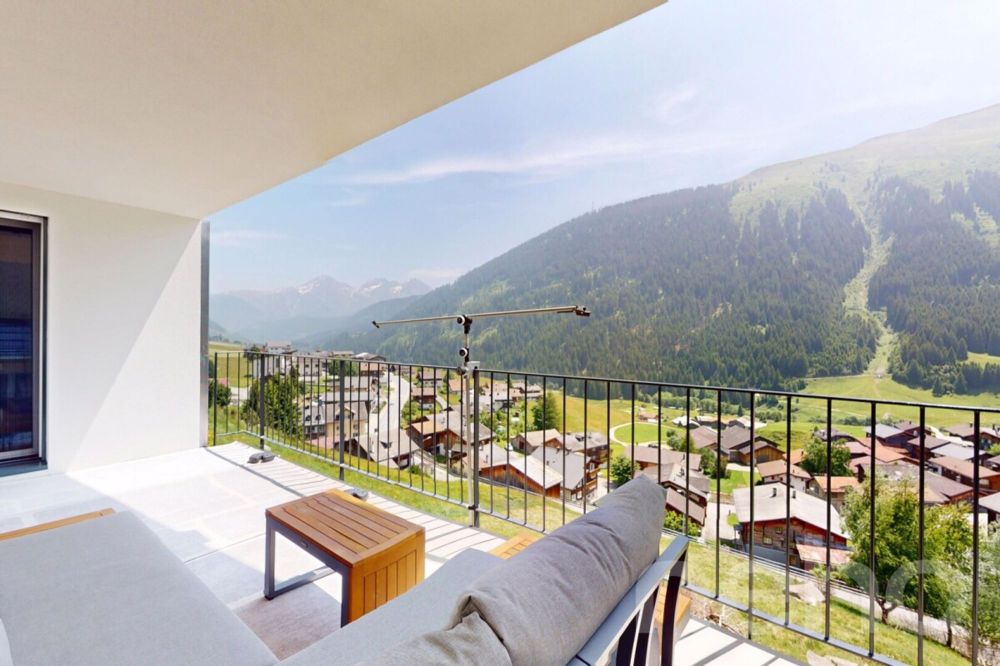 Moderne 3.5-Zimmer-Dachwohnung mit atemberaubender Aussicht in Rueras - Bild 3