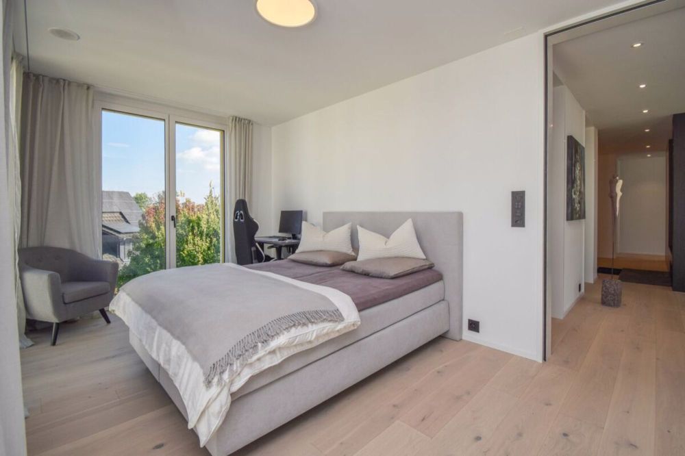 Luxuriöse 4.5-Zimmer-Attikawohnung mit idyllischem Blick ins Grüne - Kinderzimmer