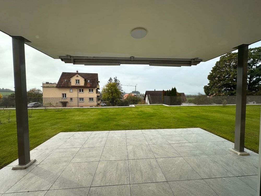 3.5-Zimmer-Gartenwohnung mit Gartenanteil - Sitzplatz mit Gartenanteil