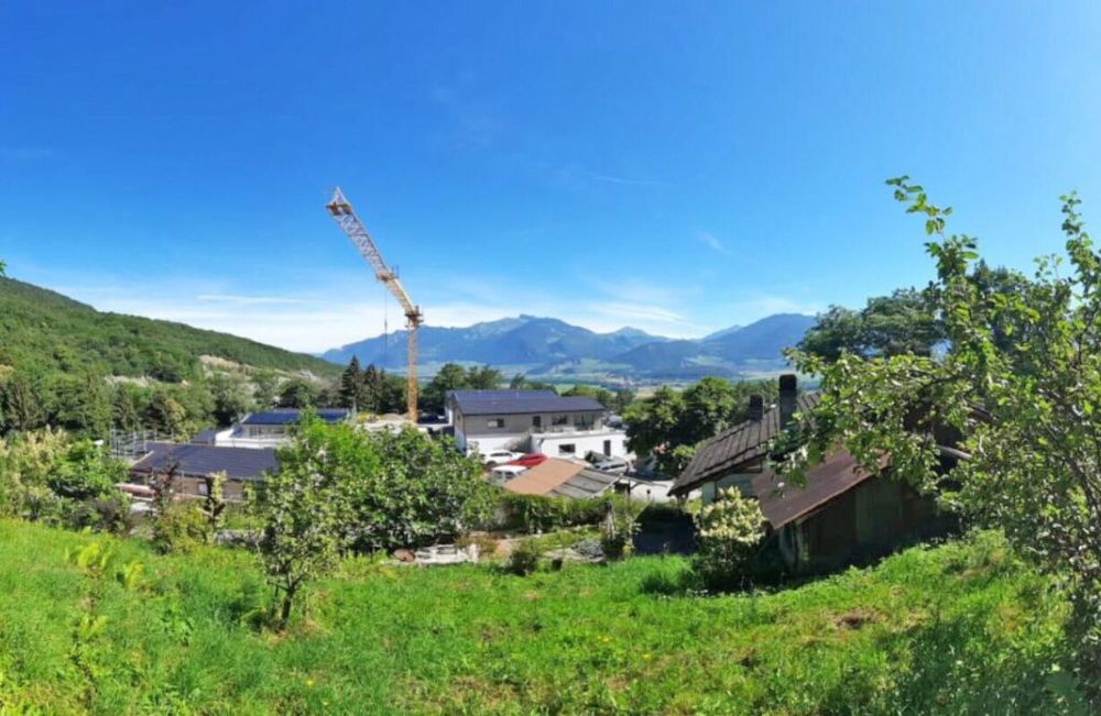 Appartement de 4,5 pièces aux combles avec sous-sol et garage double. - Vue parcelle arrirère